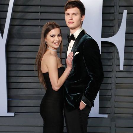 Violetta Komyshan poses a picture with her boyfriend Ansel Elgort at an event.